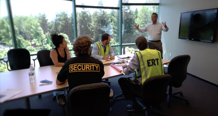 Security and emergency response teams reviewing an event